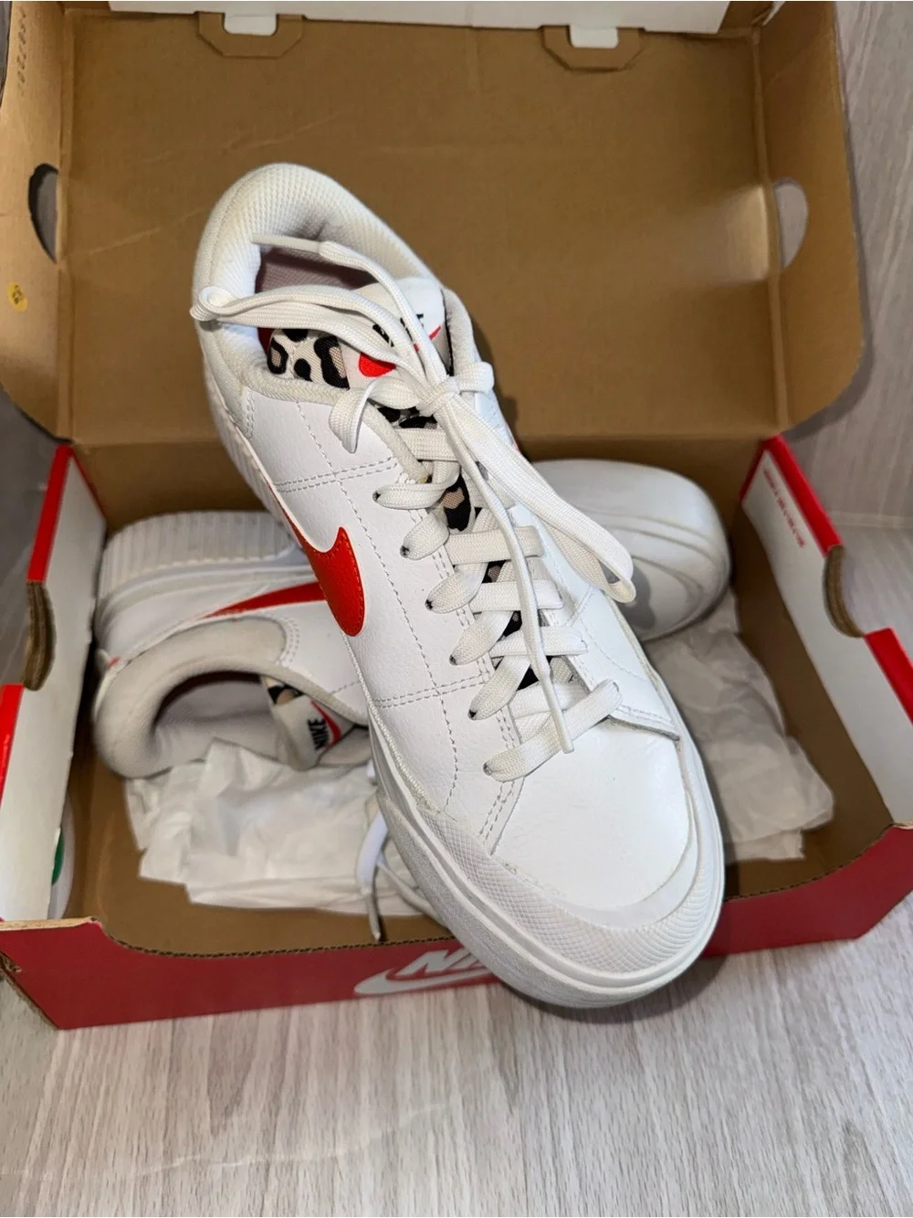 Nike White Sneakers with Orange Swoosh - Picture 2 of 3